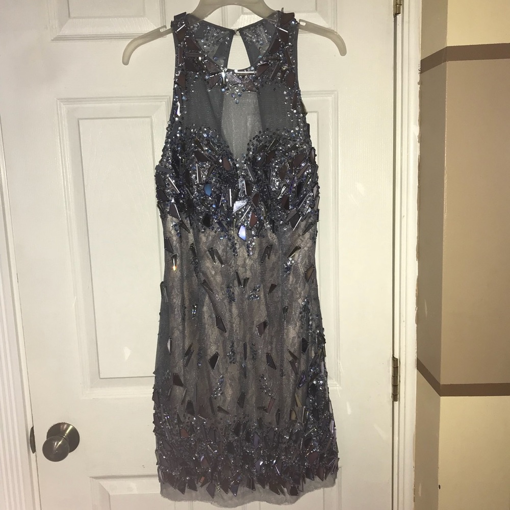 Beautiful dress decorated with glass mirror pieces